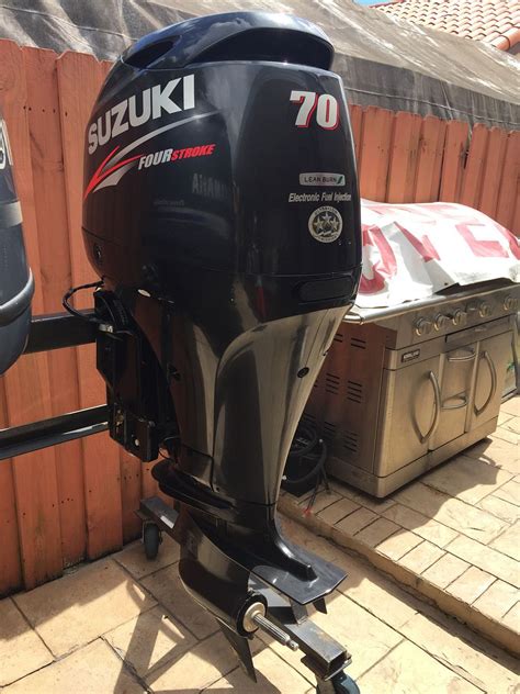 (SUZUKI internal reserch) Compact 100ps from a DF90A engine body Offset drive shaft for compact body The Largest Reduction Gear Ratio. . Suzuki 70 hp outboard for sale
